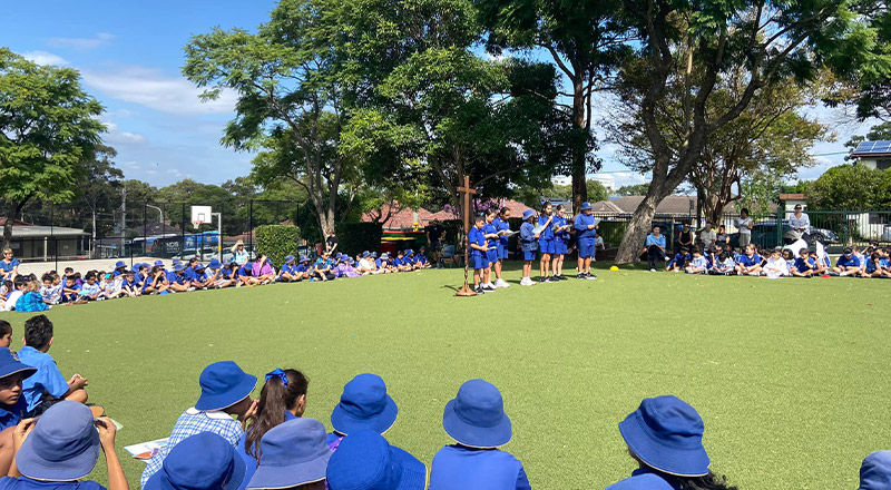 Students on the school playing field at Our Lady of Mount Carmel Primary School Wentworthville