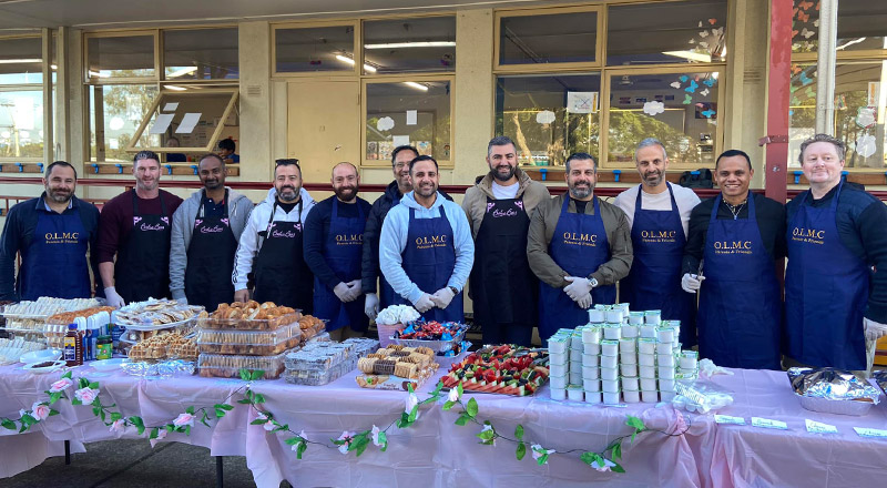 Fathers volunteering at a Mothers Day event at Our Lady of Mount Carmel Primary School Wentworthville