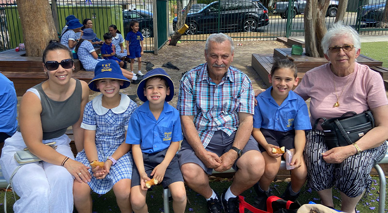 Students with their grandparents on Granparents Day at Our Lady of Mount Carmel Primary School Wentworthville