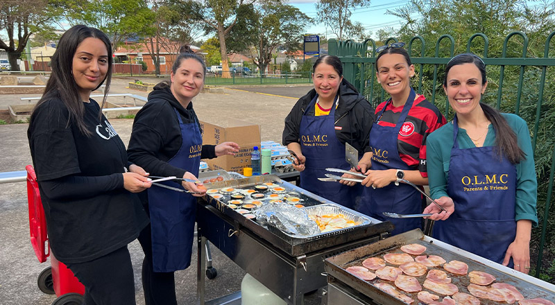 Mothers volunteering at Fathers Day event at Our Lady of Mount Carmel Primary School Wentworthville